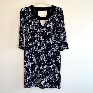 Black and white BR dress, size XS with stretchy fabric. Detailed neckline design